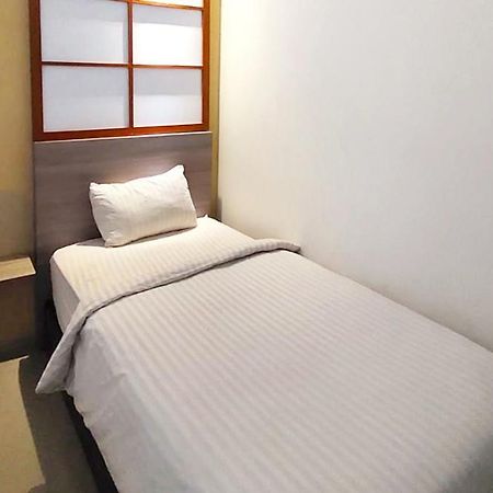Twospaces Living At Maximus Inn Palembang Eksteriør bilde