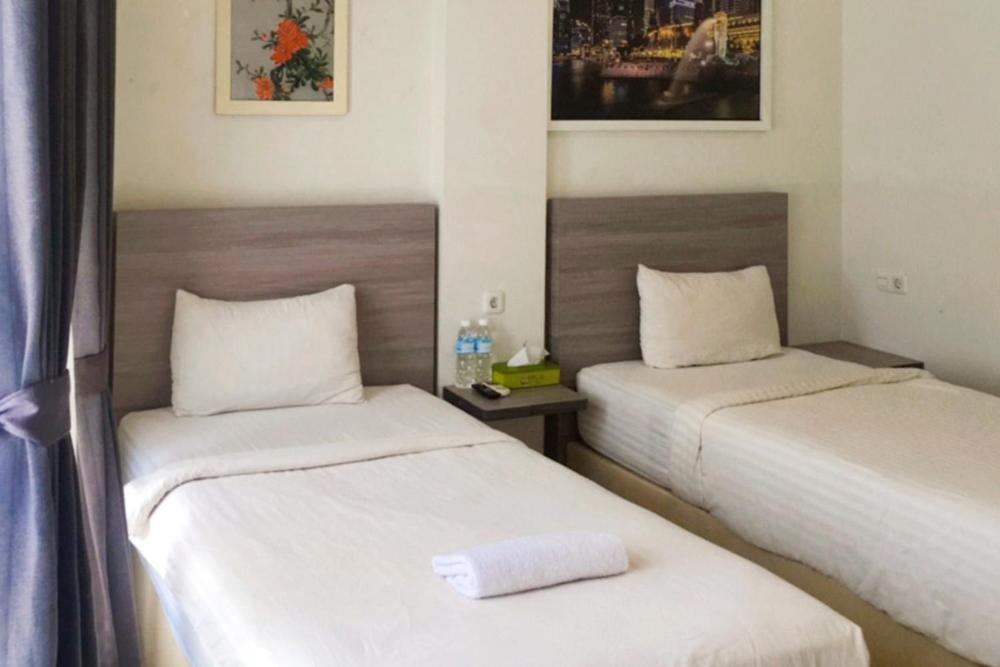 Twospaces Living At Maximus Inn Palembang Eksteriør bilde